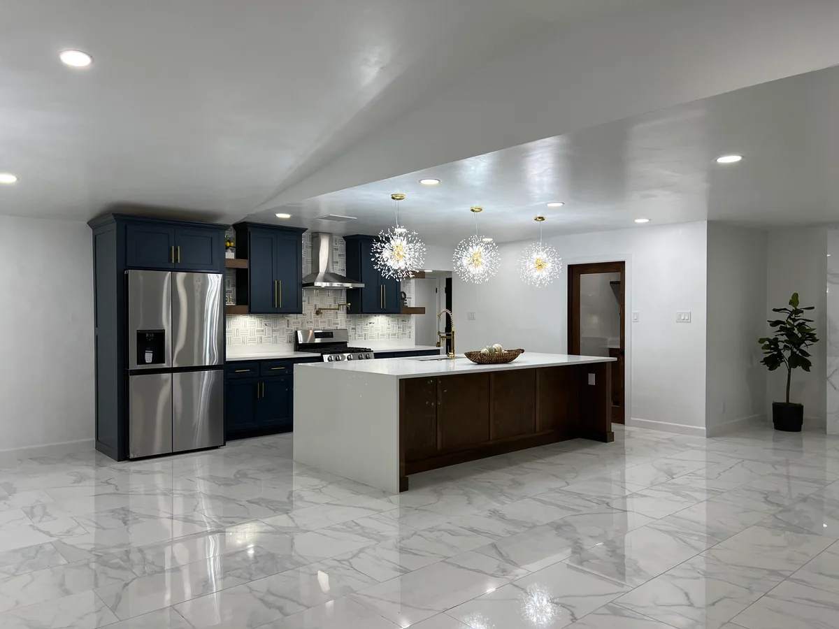 Midnight & Timber kitchen with deep blue cabinetry, wood island, view 2