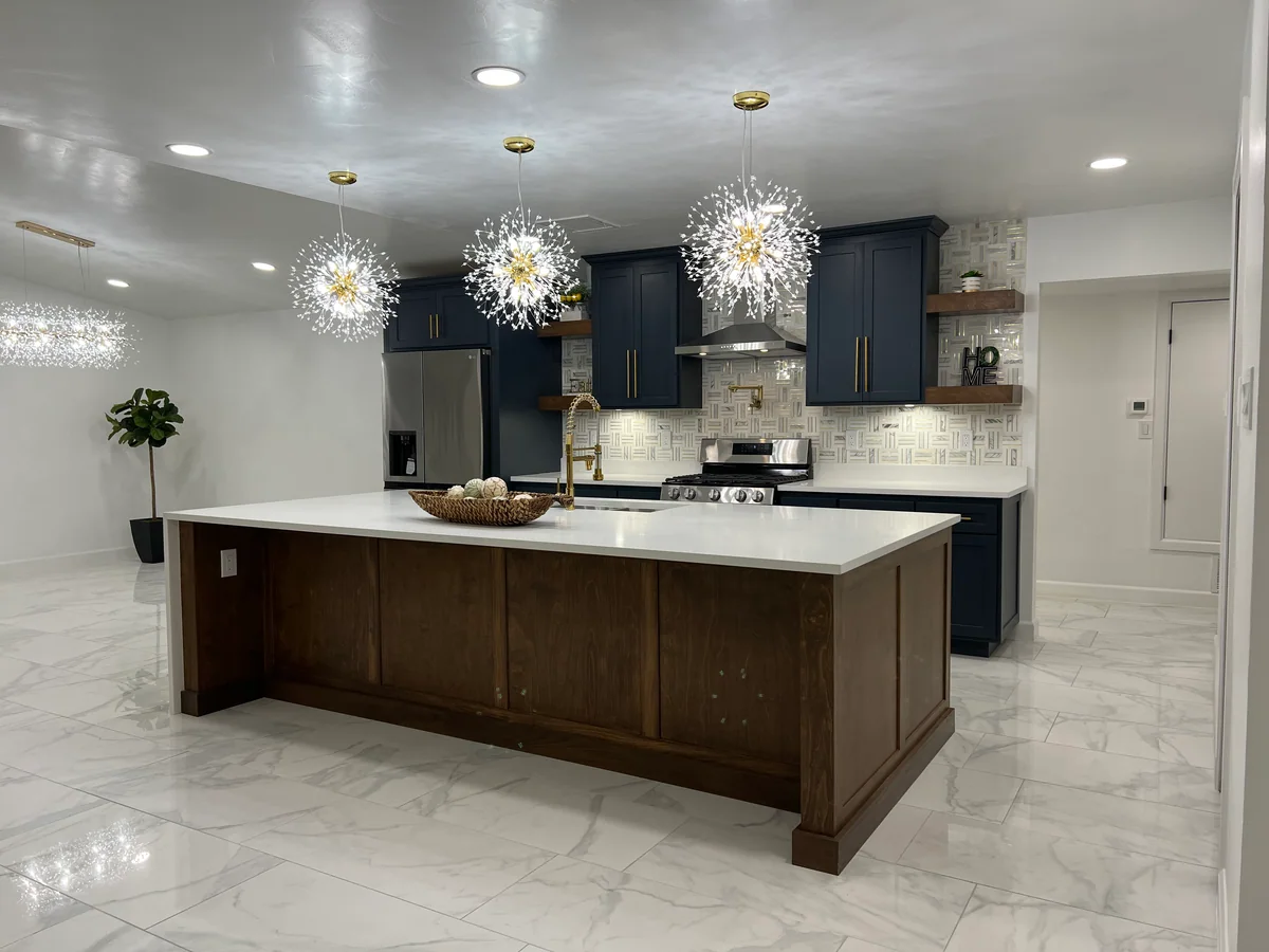 Midnight & Timber kitchen with deep blue cabinetry, wood island, view 1