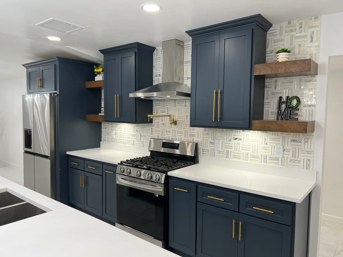 Midnight & Timber kitchen with deep blue cabinetry, wood island, view 3