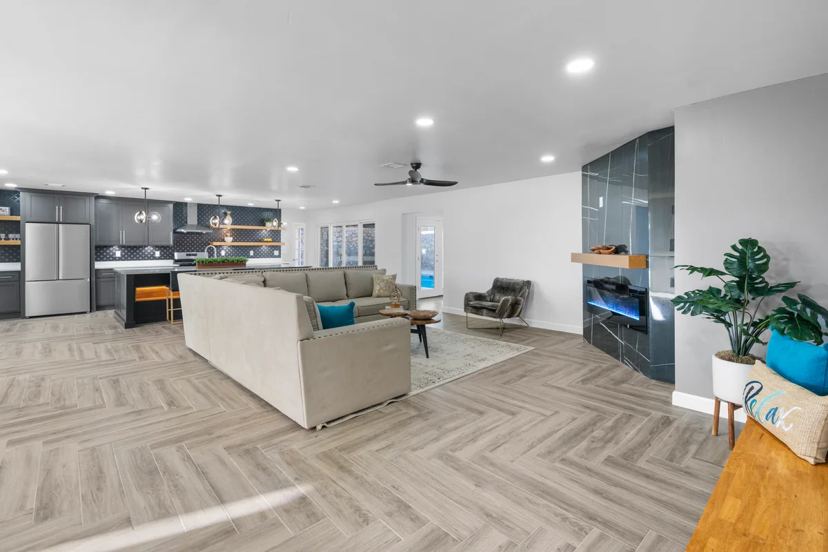 Modern Slate kitchen with gray cabinetry, floating wood shelves, view 5