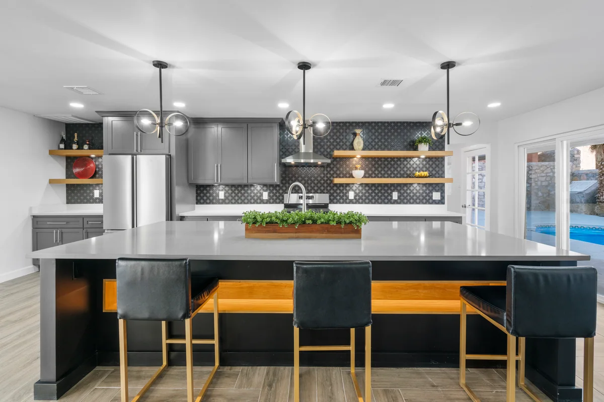Modern Slate kitchen with gray cabinetry, floating wood shelves, view 1
