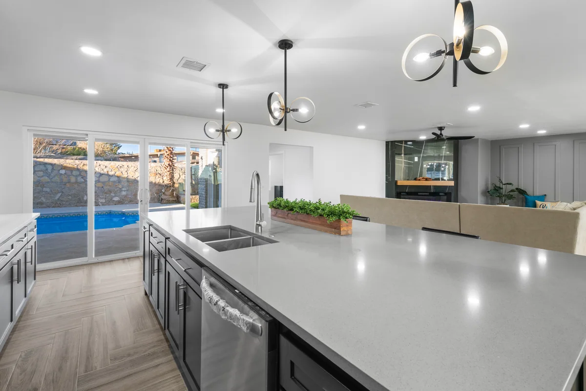 Modern Slate kitchen with gray cabinetry, floating wood shelves, view 4