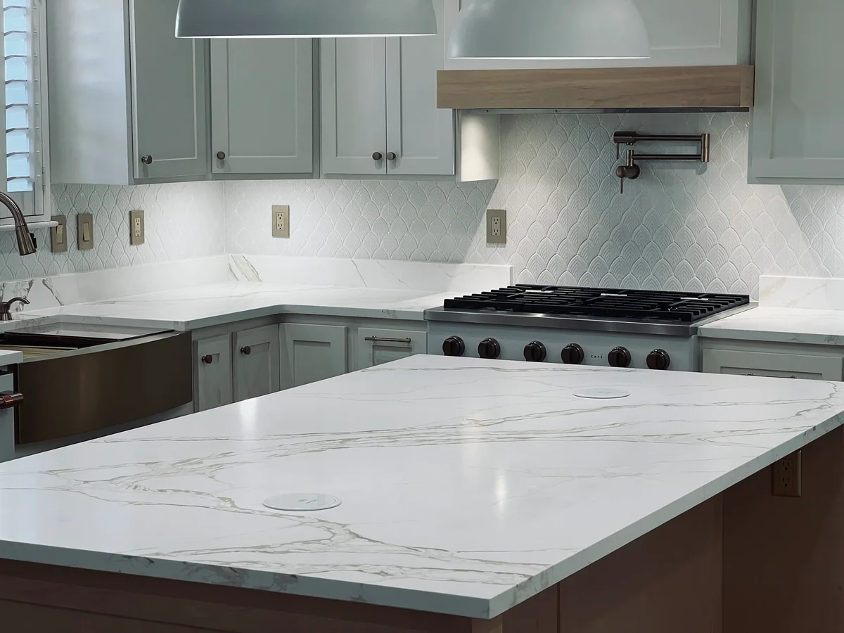 Natural Balance kitchen with white cabinetry, wood island, view 3