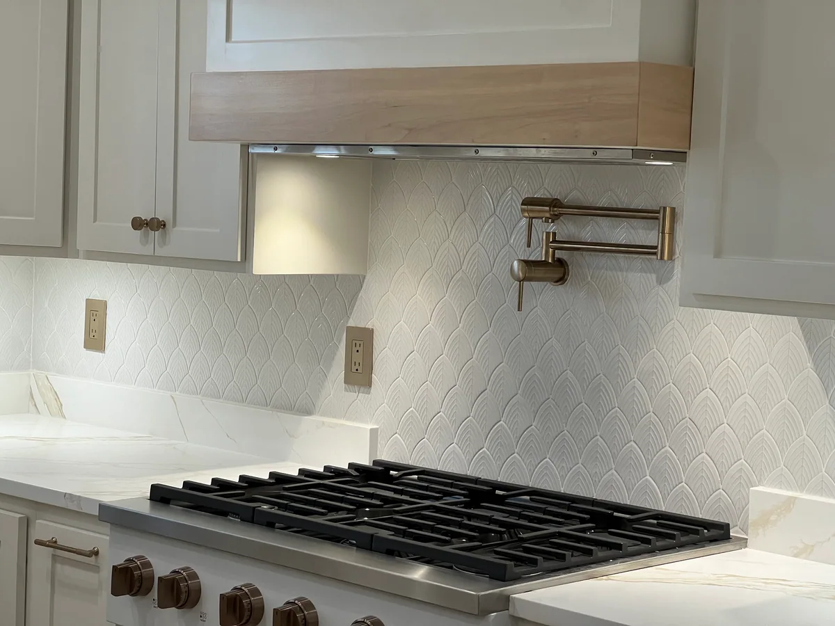 Natural Balance kitchen with white cabinetry, wood island, view 6