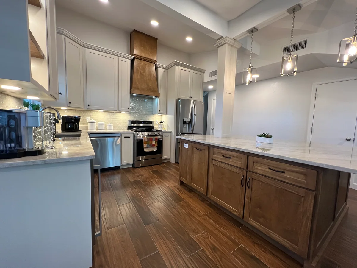 Warm Harmony kitchen with two-tone cabinetry, wood island, view 3