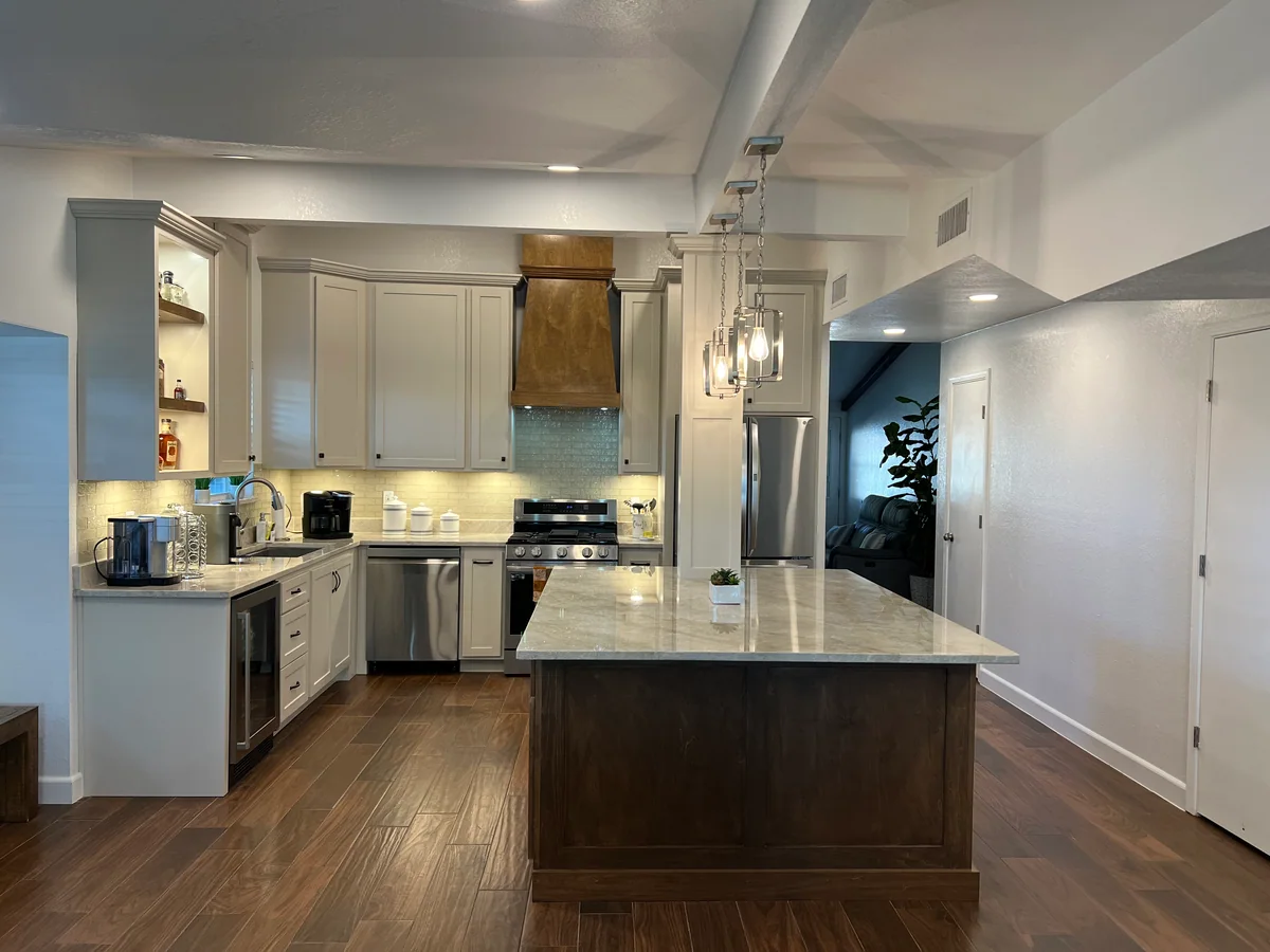 Warm Harmony kitchen with two-tone cabinetry, wood island, view 6